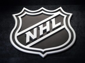 An NHL logo is shown before the start of the first round of the NHL hockey draft, in Sunrise, Fla. on June 26, 2015. (AP Photo/Alan Diaz)