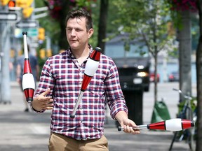 Professional busker Jay Henderson, a.k.a. Kobbler Jay, a.k.a. Seb Whipits, shows off his juggling skills in downtown Windsor on July 30, 2018. Henderson is one of the organizers of Buskerville 2018, which takes place in Walkerville Aug. 10-12.