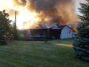 A fire at a home on Road 7 in the Kingsville area on the evening of July 8, 2018.