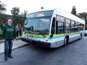 In this Sept. 5, 2017, file photo, Windsor Mayor Drew Dilkens poses with the first Transit Windsor bus serving LaSalle.