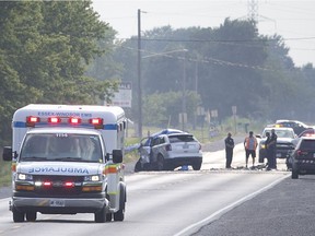 An ambulance leaves the scene of a serious motor vehicle collision on County Rd. 42 between Elmstead Road and Lakeshore Rd. 103, Sunday, July 15, 2018.