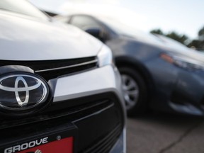 FILE - This Sunday, June 24, 2018 file photo shows the Toyota company logo on a car at a Toyota dealership in Englewood, Colo.