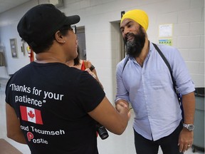 Tish Glenn from the Canadian Union of Postal Workers greets Jagmeet Singh, leader of the federal NDP at the Unifor Local 444 hall in Windsor on Saturday, July 21, 2018. He spoke with local labour representatives and workers about recent tariffs that are threatening Canadian jobs.