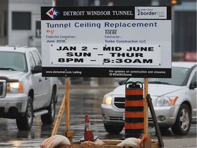 Weeknight shutdowns of the Windsor-Detroit Tunnel will continue through the fall. In this April 3, 2018, file photo, a construction sign at the tunnel's Wyandotte Street entrance in Windsor had been more hopeful of a June completion date.