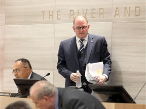 Mayor Drew Dilkens walks to his seat moments before the inaugural City Council Meeting in Windsor's new City Hall June 4, 2018.