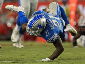 Ameer Abdullah #21 of the Detroit Lions is tackled during a preseason game against the Tampa Bay Buccaneers at Raymond James Stadium on August 24, 2018, in Tampa, Florida.