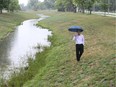 Phil Bartnik, Tecumseh's director of public works, walks through Lakewood Park on Manning Road on Aug. 16, 2018.