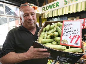 Lost food. Fred Bouzide of Fred's Farm Fresh on Huron Church Road has an issue with the road construction closures around his popular produce store. Shown Aug. 18, 2018, Bouzide said he's been forced to mark down some of his inventory, dump other produce and send employees home due to lower customer traffic.