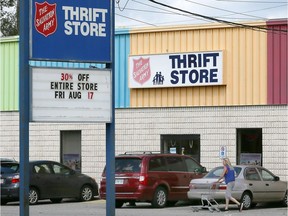 The Thrift Store operated by The Salvation Army will be closing soon. Here a Thrift Store employee gathers a shopping cart on Aug. 21, 2018.
