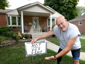 John Owen placed a handwritten sign on the front lawn of his neighbour's home at 2328 Parkwood Ave. after 18 people showed up saying they had rented the recently sold home August 23, 2018. The online rental ad was a scam. Owen spoke with Windsor police who mentioned a sign might help.