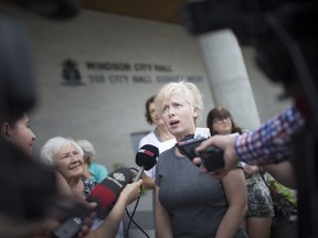 Philippa von Ziegenweidt, spokeswoman for Citizens for an Accountable Mega-hospital Planning Process (CAMPP), speaks to reporters outside Windsor city hall on Aug. 7,  2018.