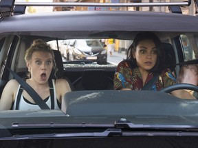 This image released by Lionsgate shows Kate McKinnon, left, and Mila Kunis in a scene from "The Spy Who Dumped Me." (Hopper Stone/Lionsgate via AP)