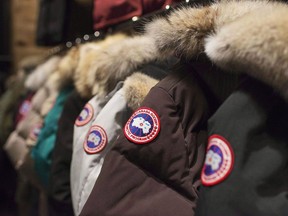 Jackets are on display at the Canada Goose Inc. showroom in Toronto on Thursday, November 28, 2013. Luxury jacket maker Canada Goose Holdings Inc. reported a net loss of $18.7 million in its first quarter as it pushed further into international markets.