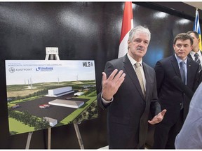 Stephen Matier, left, president of Maritime Launch Services and Maksym Degtiarov, chief designer of the launch vehicle at the Yuzhnoye Design Bureau, talk with reporters at a meeting of the proposed Spaceport project team in Dartmouth, N.S. on December 11, 2017.