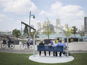 People enjoy Windsor's riverfront as temperatures became unseasonably cool on Wednesday, Aug. 22, 2018.