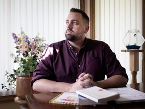 John Antoniw, pictured at his home in South Windsoron Aug. 23, 2018, is a death doula.