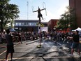 Sara Kunz performs her Flyin' Hawaiian Show at the Buskerville Festival in Walkerville on Friday, August 10, 2018.