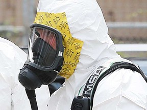 A Windsor police officer trained in dealing with hazardous materials is shown in this 2018 file photo.