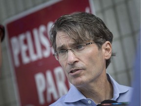 Mayoral candidate for the city of Windsor, Matt Marchand, holds a news conference outside the Pelissier Street parking garage, where a pillar of his campaign was announced on Aug. 9, 2018.