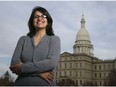 FILE - In this Thursday, Nov. 6, 2008, file photo, Rashida Tlaib, a Democrat, is photographed outside the Michigan Capitol in Lansing, Mich. In the primary election Tuesday, Aug. 7, 2018, Democrats pick former Michigan state Rep. Rashida Tlaib to run unopposed for the congressional seat that former Rep. John Conyers held for more than 50 years. Tlaib would be the first Muslim woman in Congress.