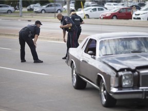 Windsor police investigate after an elderly male was struck by a vehicle on Tecumseh Road East between Annie Street and Lauzon Road on Thursday, Aug. 23, 2018.
