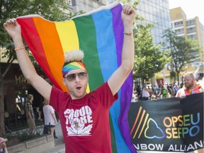 Five days of celebration mark this year's Windsor-Essex Pride Fest, which, again, features a Pride Fest Parade. In this Aug. 13, 2017, file photo, the distinctive rainbow flag gets carried down Ouellette Avenue. This year's parade, on Sunday at 11 a.m., follows along Ottawa Street.