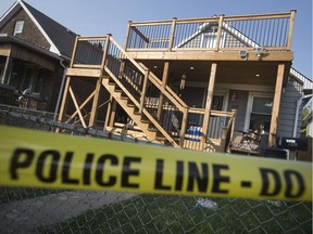 Police tape surrounds a home at 1207-1209 Henry Ford Centre Dr., near Drouillard Road, where a shooting incident during the early morning hours of Aug. 14, 2018, left a man with life-threatening injuries.