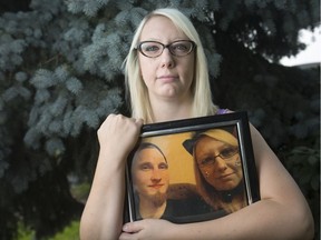 Andrea Milne, pictured Wednesday, August 15, 2018, holds a photo of her friend, Jordan Caine, who died by suicide in 2014.  September is Suicide Prevention Awareness Month.