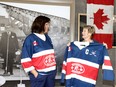 Anne Marie Schofield, left, president of Riverside Minor Hockey Association, presents a Cpl. Andrew Grenon hockey jersey to Theresa Charbonneau, mother of Cpl. Grenon, during RMHA's 60th anniversary ceremony at WFCU Centre Sept. 8, 2018. Cpl. Grenon played hockey with RMHA.