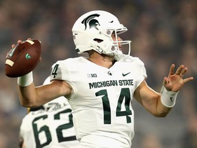 Quarterback Brian Lewerke of the Michigan State Spartans drops back to pass during the first half of the college football game against the Arizona State Sun Devils at Sun Devil Stadium on Sept. 8, 2018 in Tempe, Arizona.