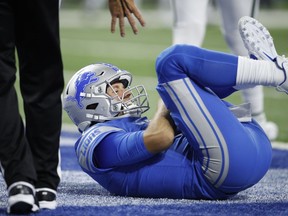 Matthew Stafford of the Detroit Lions on the ground after an injury in the second quarter against the New York Jets at Ford Field on Sept. 10, 2018 in Detroit.