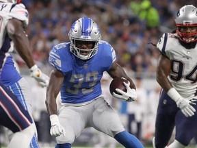 Detroit Lions rookie Kerryon Johnson #33 became the club's first running back to rush for over 100 yards and Detroit head coach Matt Patricia got his first NFL win with a 26-10 victory over the New England Patriots on Sunday at Ford Field.
