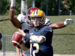 University of Windsor quarterback Colby Henkel threw for one touchdown and ran in another in his OUA debut on Saturday, but the Lancers fell to Guelph.