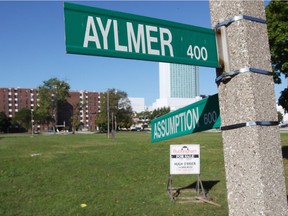 Street signs mark Aylmer Avenue and Assumption Street. Two men were taken to hospital following a stabbing incident near this intersection.