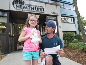 Jamie Read brought his six-year-old daughter Alexia to the Windsor-Essex County Health Unit to verify her immunization records on Wednesday.