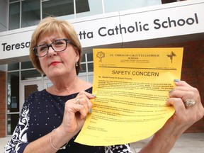St. Teresa of Calcutta Catholic School principal Elise Daragon holds a letter which was sent home to parents after a discarded syringe was found earlier this week.  Daragon and staff used the incident as a teachable moment September 19, 2018.