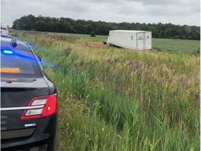 Charges have been laid against the driver of a tractor trailer as well as the company she drives for, after her truck left Highway 401 last Thursday.