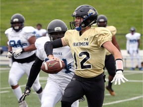 Windsor AKO Fratmen quarterbacks Dan Mailloux (12) threw for three touchdowns and ran for another in Saturday's win over the Hamilton Hurricanes.