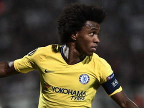 Chelsea's Brazilian midfielder Willian celebrates after scoring a goal during  the UEFA Europa League Group L first-leg football match between PAOK Thessaloniki and Chelsea at the Toumba stadium in Thessaloniki on September 20, 2018.