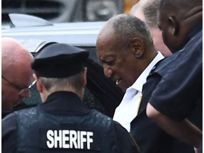 Comedian Bill Cosby is taken into custody at Montgomery County Courthouse Sept. 25, 2018 in Norristown, Pennsylvania, after being sentenced to at least three years in prison and branded a "sexually violent predator" for assaulting a woman at his Philadelphia mansion 14 years ago. The 81-year-old, once beloved by millions as "America's Dad," is the first celebrity convicted and sentenced for a sex crime since the downfall of Harvey Weinstein ushered in the #MeToo movement and America's reckoning with sexual harassment.