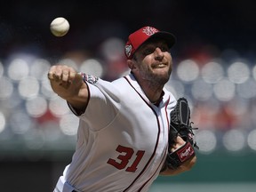 Washington Nationals starting pitcher Max Scherzer delivers during the fifth inning of a baseball game against the St. Louis Cardinals on Sept. 3, 2018, in Washington.