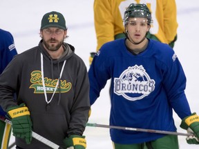 Humboldt Broncos returning player Brayden Camrud and head coach Nathan Oystrick are seen during a team practice Tuesday, Sept. 11, 2018. Oystrick is adamant his door will always be open for Humboldt Broncos players to come and chat this season.