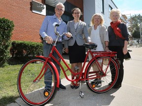 Barry Brodie, left, director of the Sho Studios, is shown with Bike Windsor Essex board member Kim Orr, executive director Lori Newton and board member Philippa von Ziegenweidt on Sept. 28, 2018. The cycling advocacy group has found a new home in Olde Walkerville.