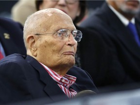 FILE - In this Oct. 19, 2016, file photo, former U.S. Rep. John Dingell, D-Mich., listens to Democratic vice presidential candidate Sen. Tim Kaine, D-Va. speak during a campaign stop in Detroit. Dingell is in a Detroit-area hospital after suffering a heart attack early Monday, Sept. 17, 2018.