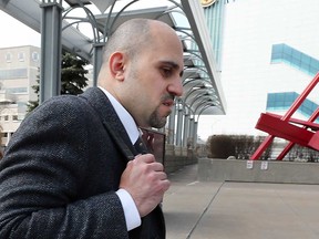 Dr. Bassam El-Tatari leaves the Superior Court of Justice building in Windsor in April 2018.