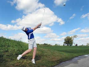 Vista Academy's Carter Purves hits an iron shot during the WECSSAA golf championships at the Ambassador Golf Club on Wednesday. Purves shot nine-over 80 to and qualified for Tuesday's SWOSSAA championships in Blenheim.