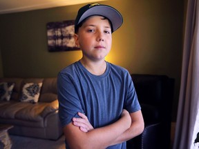 Kaleb Houle, 13, who died Saturday after being diagnosed three separate times with Stage 4 cancer, is shown at his Windsor, ON. home on Thursday, September 20, 2018.
