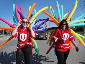 Unifor members Christina Hitchen, left, and Katie Reeb are shown during the annual Labour Day Parade on Sept. 3, 2018, in Windsor