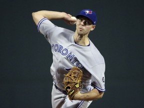 Toronto Blue Jays starting pitcher Sam Gaviglio delivers to the Boston Red Sox in the first inning of a baseball game at Fenway Park, Thursday, Sept. 13, 2018, in Boston.