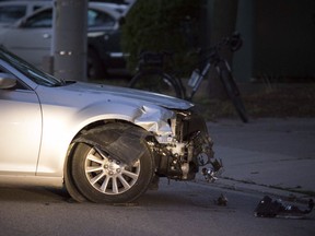 Smashed front end, with missing bumper, of a Chrysler 300 involved in a motor vehicle collision in the 1600 block of Pelissier Street, just north of Tecumseh Road West, on Sept. 11, 2018.